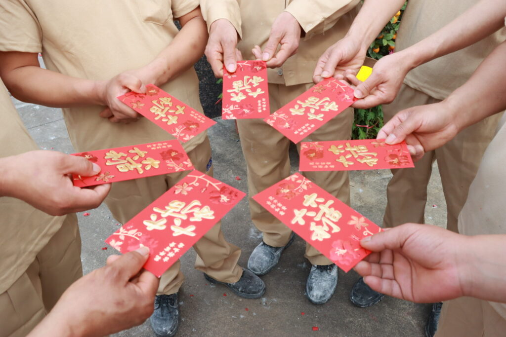 the workers made a circle around the red they received